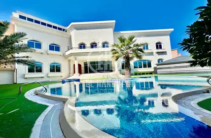 Pool image for: Villa - 7 Bedrooms for rent in Al Karamah - Abu Dhabi, Image 1