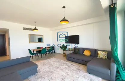 Living / Dining Room image for: Apartment - 2 Bedrooms - 3 Bathrooms for rent in Pacific Samoa - Pacific - Al Marjan Island - Ras Al Khaimah, Image 1