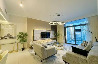 صورة لـ غرفة المعيشة شقة - 3 غرف نوم - 4 حمامات للايجار في برج التاج - دبي وسط المدينة - دبي ، صورة رقم 1