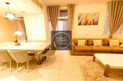 Living / Dining Room image for: Apartment - 3 Bedrooms - 3 Bathrooms for rent in Capital Gate - Capital Centre - Abu Dhabi, Image 1