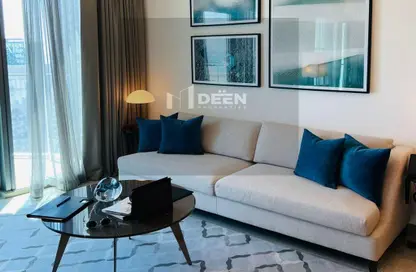 Living Room image for: Apartment - 1 Bedroom - 2 Bathrooms for rent in Address Harbour Point Tower 1 - Address Harbour Point - Dubai Creek Harbour (The Lagoons) - Dubai, Image 1