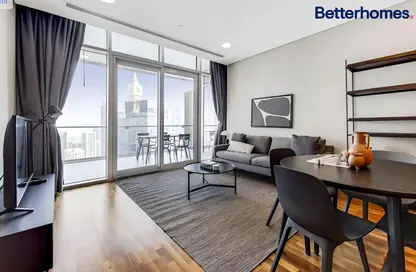 Living / Dining Room image for: Apartment - 1 Bedroom - 2 Bathrooms for sale in Burj Daman - DIFC - Dubai, Image 1