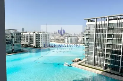 صورة لـ حوض سباحة شقة - غرفة نوم - 2 حمامات للايجار في مساكن 14 - المنطقة وان - مدينة الشيخ محمد بن راشد - دبي ، صورة رقم 1