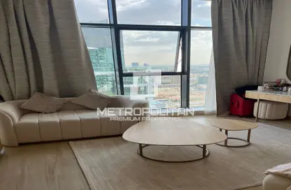 Living Room image for: Apartment - 1 Bathroom for sale in Regina Tower - Jumeirah Village Circle - Dubai, Image 1