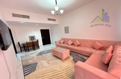 Living / Dining Room image for: Apartment - 2 Bedrooms - 2 Bathrooms for rent in Al Rashidiya Towers - Ajman Downtown - Ajman, Image 1