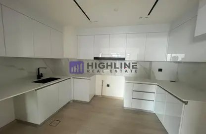 Kitchen image for: Apartment - 2 Bedrooms - 3 Bathrooms for rent in Binghatti Heights - Jumeirah Village Circle - Dubai, Image 1