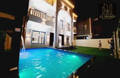 Pool image for: Villa - 5 Bedrooms - 7 Bathrooms for sale in Al Maha Village - Al Zahya - Ajman, Image 1