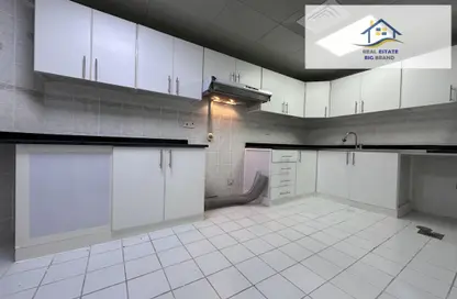 صورة لـ مطبخ شقة - 2 غرف نوم - 2 حمامات للايجار في الخالدية - أبوظبي ، صورة رقم 1