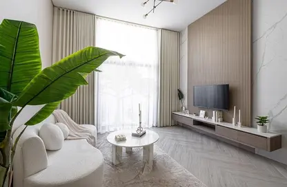 Living Room image for: Apartment - 1 Bedroom - 2 Bathrooms for sale in Laya Heights - Dubai Studio City - Dubai, Image 1