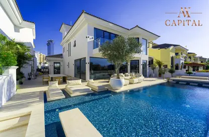 Pool image for: Villa - 5 Bedrooms - 6 Bathrooms for sale in Garden Homes Frond B - Garden Homes - Palm Jumeirah - Dubai, Image 1