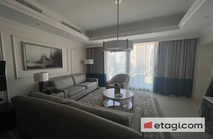 Living Room image for: Apartment - 1 Bedroom - 2 Bathrooms for sale in Kempinski BLVD - Downtown Dubai - Dubai, Image 1