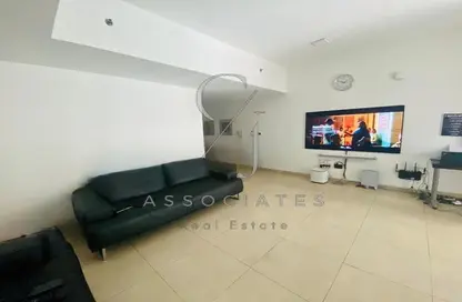 Living Room image for: Apartment - 1 Bedroom - 2 Bathrooms for sale in Victoria Residency - Al Furjan - Dubai, Image 1