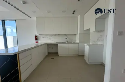 Kitchen image for: Townhouse - 3 Bedrooms - 3 Bathrooms for rent in Cherrywoods - Dubai Land - Dubai, Image 1