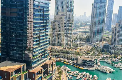 Outdoor Building image for: Apartment - 2 Bedrooms - 3 Bathrooms for sale in Cayan Tower - Dubai Marina - Dubai, Image 1