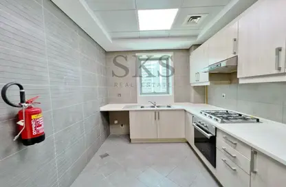 صورة لـ مطبخ شقة - 2 غرف نوم - 3 حمامات للايجار في ارت اكس اي في - الخليج التجاري - دبي ، صورة رقم 1