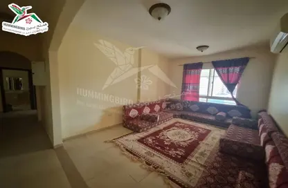Living Room image for: Apartment - 2 Bedrooms - 3 Bathrooms for rent in Al Dafeinah - Asharej - Al Ain, Image 1