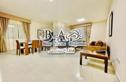 Living / Dining Room image for: Apartment - 2 Bedrooms - 2 Bathrooms for rent in Al Kali Building - Tourist Club Area - Abu Dhabi, Image 1