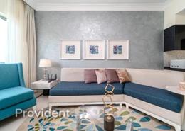 Living Room image for: Hotel and Hotel Apartment - 2 bathrooms for sale in The Signature - Burj Khalifa Area - Downtown Dubai - Dubai, Image 1