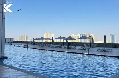 Apartment - 1 Bedroom - 2 Bathrooms for sale in Corniche Tower - Ajman Corniche Road - Ajman