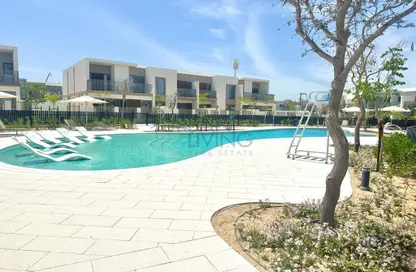 صورة لـ حوض سباحة تاون هاوس - 3 غرف نوم - 4 حمامات للايجار في ايلان - تلال الغاف - دبي ، صورة رقم 1