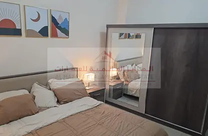 شقة - 2 غرف نوم - 2 حمامات للايجار في برج منازل 2 - شارع التعاون - التعاون - الشارقة