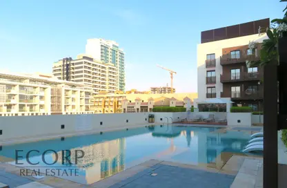 Pool image for: Apartment - 1 Bedroom - 2 Bathrooms for sale in Eaton Place - Jumeirah Village Circle - Dubai, Image 1