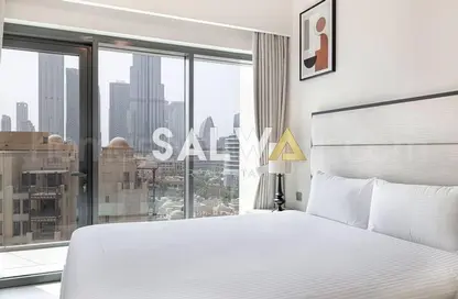 Room / Bedroom image for: Apartment - 2 Bedrooms - 2 Bathrooms for sale in Burj Royale - Downtown Dubai - Dubai, Image 1