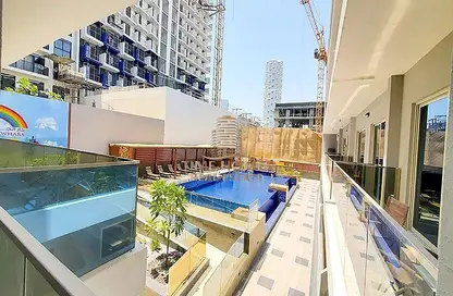 Pool image for: Apartment - 1 Bathroom for rent in Dar Al Jawhara - Jumeirah Village Circle - Dubai, Image 1