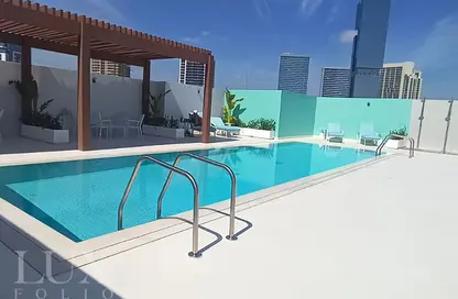 Pool image for: Apartment - 1 Bathroom for rent in Luma21 - Jumeirah Village Circle - Dubai, Image 1
