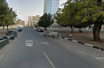 أرض - استوديو للبيع في بناية ابو شغاره 2 - بودانق - القاسمية - الشارقة