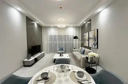 Living / Dining Room image for: Apartment - 1 Bedroom - 2 Bathrooms for sale in Nadine Residences 2 - Nadine Residences - Al Furjan - Dubai, Image 1