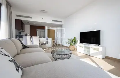 Living Room image for: Apartment - 2 Bedrooms - 2 Bathrooms for sale in Le Pont - La Mer - Jumeirah - Dubai, Image 1