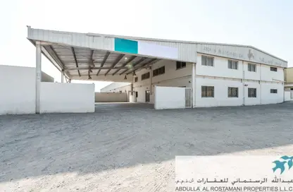 Warehouse - Studio - 2 Bathrooms for rent in Umm Ramool - Dubai