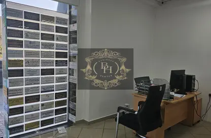 مكتب عمل جماعي - استوديو - 4 حمامات للايجار في بناية النافورة 1 - 2  الروضة - الروضة - عجمان