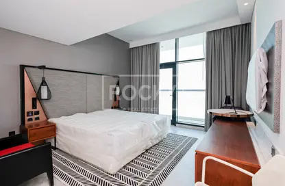 صورة لـ غرفة- غرفة النوم شقة - 1 حمام للبيع في برج دولفين - الخليج التجاري - دبي ، صورة رقم 1