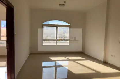 Empty Room image for: Apartment - 1 Bedroom - 2 Bathrooms for rent in Al Amir Residence - Jumeirah Village Circle - Dubai, Image 1