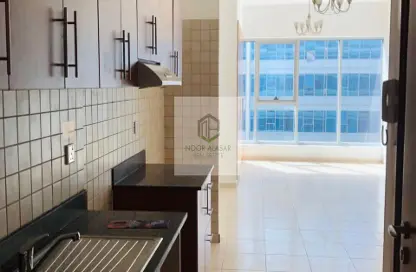صورة لـ مطبخ شقة - 1 حمام للايجار في سكاي كورتس تاور C - أبراج سكاي كورتس - دبي لاند - دبي ، صورة رقم 1
