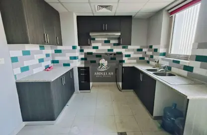 شقة - 2 غرف نوم - 2 حمامات للايجار في شقق حديقة الزاهية - الزاهية - تجارية مويلح - الشارقة