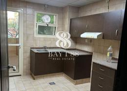 Kitchen image for: Whole Building - 8 bathrooms for rent in Ewan Residence 1 - Ewan Residences - Dubai Investment Park - Dubai, Image 1