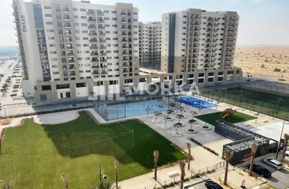 Outdoor Building image for: Apartment - 1 Bedroom - 1 Bathroom for sale in UNA Apartments - Town Square - Dubai, Image 1