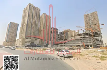 Land - Studio for sale in Paradise Lakes Tower B9 - Paradise Lakes Towers - Emirates City - Ajman