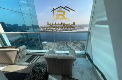 Balcony image for: Apartment - 2 Bedrooms - 2 Bathrooms for rent in Oasis Tower - Al Rashidiya 1 - Al Rashidiya - Ajman, Image 1