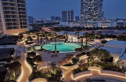 Pool image for: Apartment - 3 Bedrooms - 4 Bathrooms for sale in Hameni Tower - Jumeirah Village Circle - Dubai, Image 1