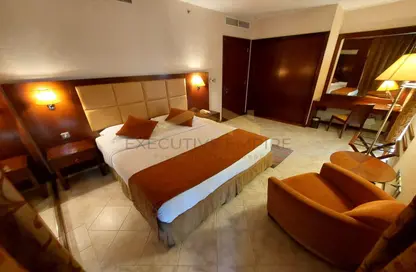 Room / Bedroom image for: Apartment - 1 Bedroom - 1 Bathroom for rent in Beach Rotana - Tourist Club Area - Abu Dhabi, Image 1