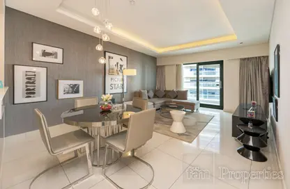 Living / Dining Room image for: Apartment - 1 Bedroom - 2 Bathrooms for rent in Tower A - DAMAC Towers by Paramount - Business Bay - Dubai, Image 1