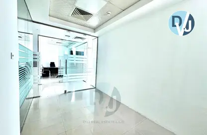 Office Space - Studio - 1 Bathroom for rent in The Prism - Business Bay - Dubai