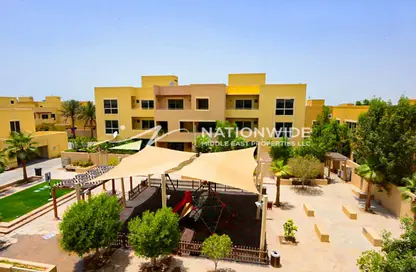 Outdoor Building image for: Townhouse - 3 Bedrooms - 4 Bathrooms for sale in Yasmin Community - Al Raha Gardens - Abu Dhabi, Image 1