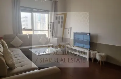 Living Room image for: Apartment - 2 Bedrooms - 2 Bathrooms for sale in Al Qasba - Sharjah, Image 1