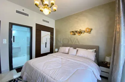 Room / Bedroom image for: Apartment - 1 Bedroom - 2 Bathrooms for rent in Jewelz by Danube - Arjan - Dubai, Image 1