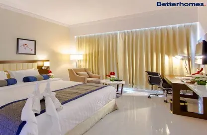 صورة لـ غرفة- غرفة النوم النزل و الشقق الفندقية - غرفة نوم - 2 حمامات للايجار في تريبان للاجنحة الفندقية لفخر الدين - مدينة دبي الرياضية - دبي ، صورة رقم 1